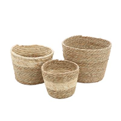 China Straw Household Sea Grass Storage Basket African Dry Grass Basket Corn Rope and Sustainable Natural Handmade Rush Grass Basket Wholesale for sale