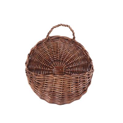 China Retro Woven Hanging Hanging Basket Idyllic Handmade Natural Sustainable Wicker Storage Basket For Garden Flower Basket for sale