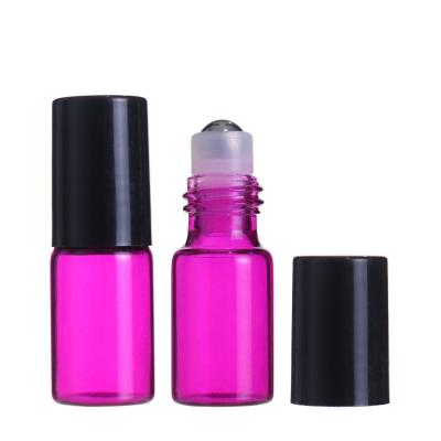 China Cosmetic High Quality 3ml Pink Green Glass Roll On Bottles With Black Housing Stainless Steel Trackball For Essential Oils for sale