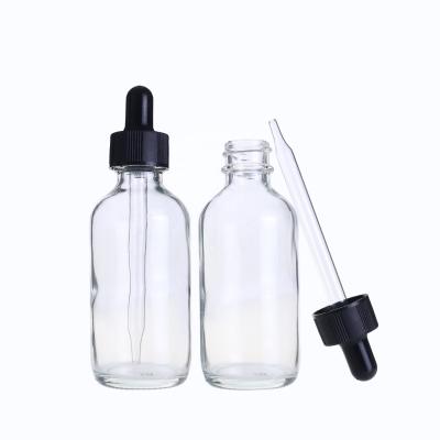 China 1oz 2oz 30ml 60ml Boston Amber Clear Serum Cosmetic Oil Glass Dropper Bottles With Pipette for sale