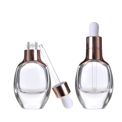 China 30ml Rose Gold Aluminum Cover Cap Irani Attar Luxury Silver Cosmetic Serum Essential Oil Dropper Glass Bottle for sale