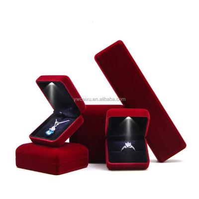 China Custom Luxury Elegant Stock Ring Box Velvet Led Jewelry Box Jewelry Display Gift Packaging Case For Proposal Engagement Wedding for sale