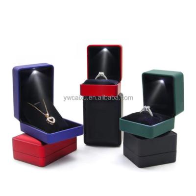 China White Jewelry Display Gift Packing Case Luxury Custom Stock Ring Box PU Led Light Jewelry Box Gift With Custom Logo for sale