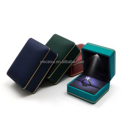 China Luxury Stock Custom Ring Box Plastic Jewelry Display Gift Packing Case White Led Light Jewelry Box Gift With Custom Logo for sale