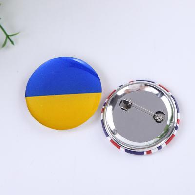 China Popular Europe Wholesale Personality Ukraine Flag Lapel Pins Around 58MM Button Badge Decorative Pins for sale