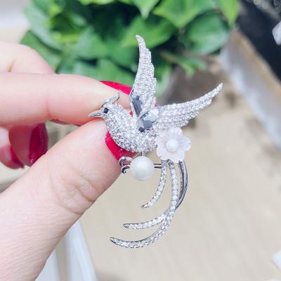 China Fashionable Beautiful Girl's Jewelry Design Pearl Flower Zircon Bird Brooch For Women for sale