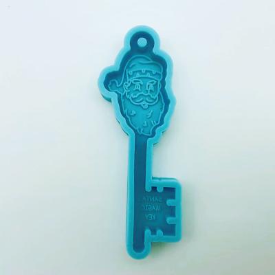 China New Design Viable Santa Claus Shape Epoxy Key Chain Silicone Mold for sale