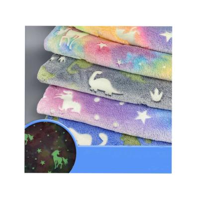 China Breathable Double Sided Colorful Glow In The Dark Stars Moon Print Home Textiles Flannel Fabric for sale