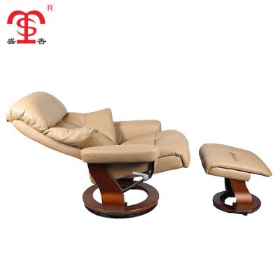 China Super Comfortable Wood Base Full Light Brown PU Leisure Relax Recliner Chair With Stool for sale