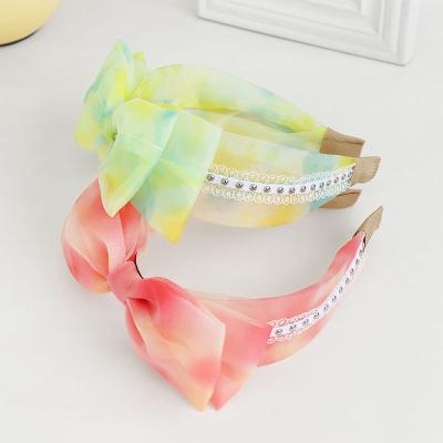 China Korean Fashion Net Cute Girl Bow Hair Band Outer Newcomer Yarn Dress for sale