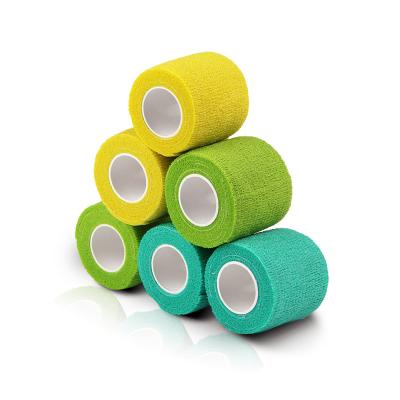 China Medical Super Elastic Medical Dressing And Wrapping Colored Self Adhesive Nonwoven Cohesive Bandage Adhesive Elastic Bandage for sale