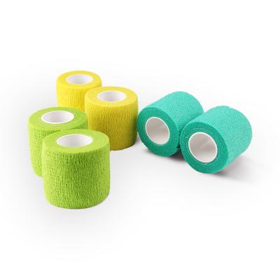 China Medical Dressing and Packaging of Colorful Self-adhesive Non-woven Cohesive Elastic Wrap Bandage Adhesive Elastic Bandage for sale