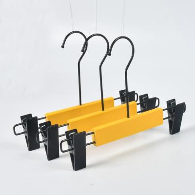 China Behind Doors/On Walls High Quality Bright Color Wooden Hangers Baby Pants Hanger With Clips for sale