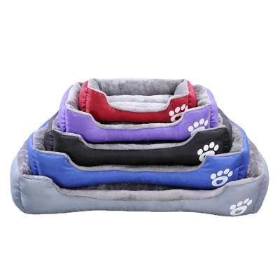 China Custom Printing Logo Convenience Wash Luxury High End Velvet Pet Nest Comfortable Soft Small Bed M for sale