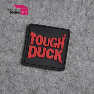 China Viable Custom Soft Silicone Badge PVC Apparel Rubber Patch for sale