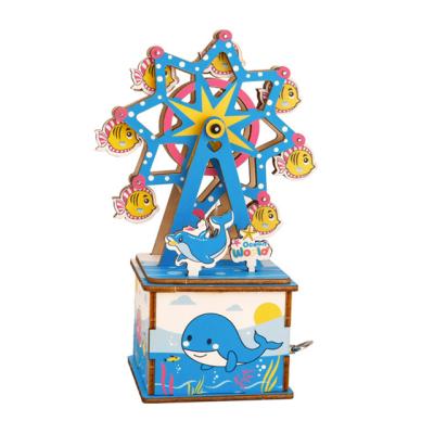 China New wooden wholesale diy puzzle custom hand-cranked song music box for kids gift for sale