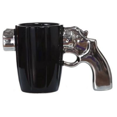 China Viable Creative Funny Ceramic Personality Revolver Mug Coffee Mug Cool Funny Coffee Mug for sale