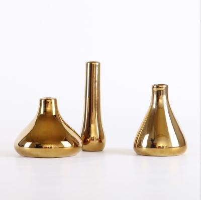 China 2021 Art Decor Gold Hot Selling Electroplating Ceramic Vase Nordic Simple Modern Home Ornaments Home Decoration Three Piece Set for sale