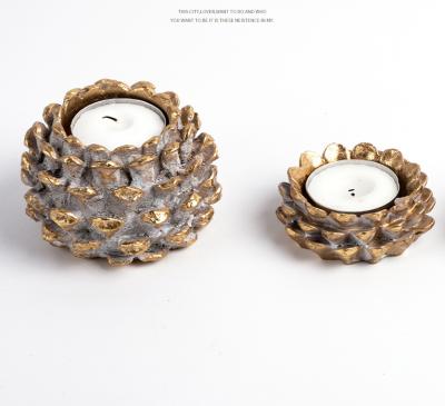 China 2021 Creative Retro Popular Resin Pine Cone Candlestick Decoration Christmas Birthday Decoration Candlestick For Home Decor for sale