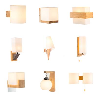 China Modern Cheap Fashion Wall Lamp Innovative Glass Shade Wood Nordic Sconce Home Indoor Bedside E27 Led Wall Lamp for sale