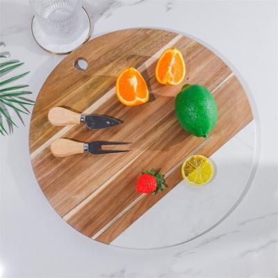 China Sustainable Circular Hanging Perforated Design , Marble Wood Splicing Dual Function Cutting Board for sale