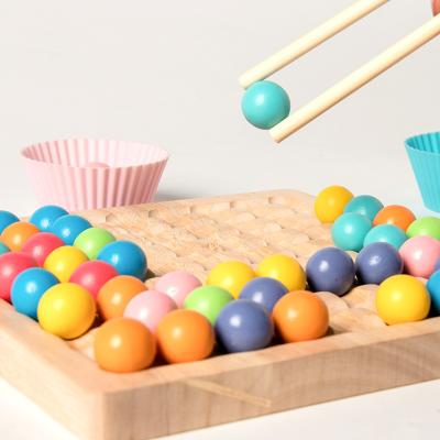 China Educational Kids Wooden Clip Bead Toy Montessori Early Children Wooden Clip Small Ball Puzzle Board Fun Chopsticks Practice Kit Game Toy for sale