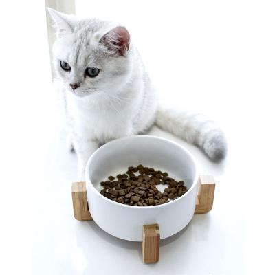 China Popular Stylish Non-automatic Neck Protect Porcelain Ceramic Pet Bowl With Wooden Holder For Cat Dog for sale