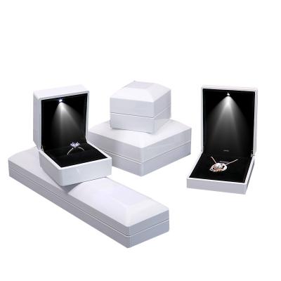 China 2021 Wholesale Cheap Price Handmade Matted Paint White Jewelry Led Ring Box Custom With LOGO for sale