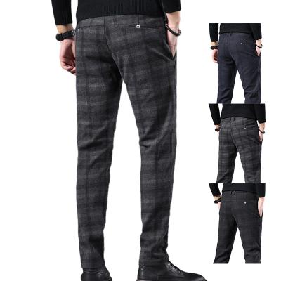 China Anti-wrinkle casual pants 2022 new fashion zipper plaid pants mens casual pants wholesale custom made man long pants for sale