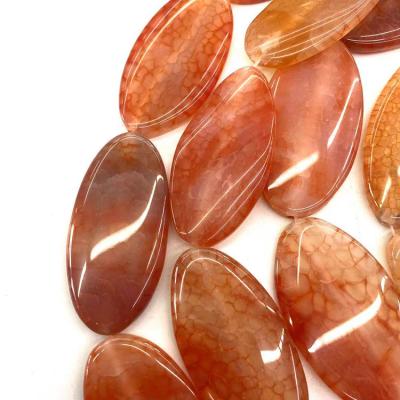 China Wholesale Necklace Agate Flakes 25*50mm Good Quality Watermelon Red Agate Flakes Faceted Oval Gemstone For Jewelry Making for sale