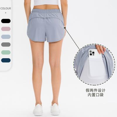 China Breathable Fake Two Piece Sports Shorts With Pockets Light Up Heavy Duty Loose Tennis Fitness Clothing Women Running Quick Dry Yoga Pants for sale