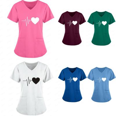 China Fashionable design cotton polyester hospital uniforms beautiful hospital scrubs women to nurse printed heart scrub tops for sale