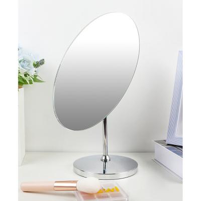 China Modern 360 Degree Lighted Rotating Oval Metal Mirror Bedroom Hd Makeup Princess Mirror for sale