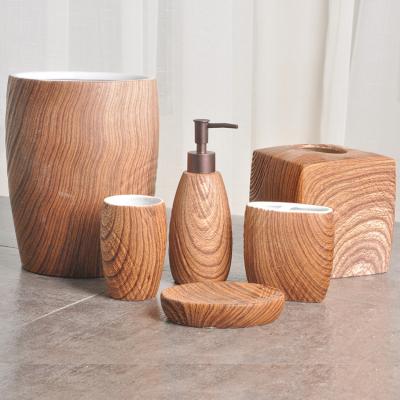 China Sustainable Elegant Brown 6 Pieces Bathroom Accessories Ceramic Set Material Hotel for sale