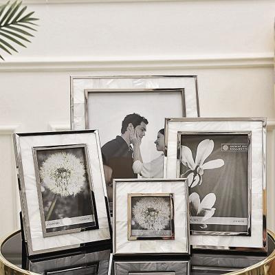 China Luxury Factory Customized Light Luxury Natural Shell Photo Frame, Metal Photo Frame With Natural River Shell Decoration Face Paper Fram for sale