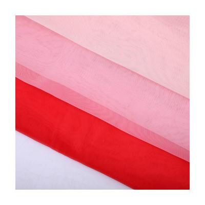 China Decoration Tulle Roll Sheer Polyester Organza And Nylon High Density Breathable Wedding Tulle For Curtain Wedding for sale