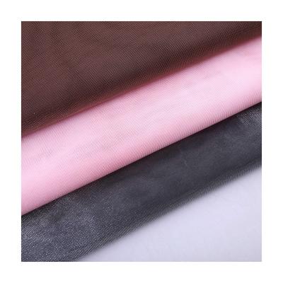 China Factory Direct Selling Fashion QUICK DRY Organza Mesh Full Polyester Sparkle Small Grid Organza Tulle DNA Fabric for sale