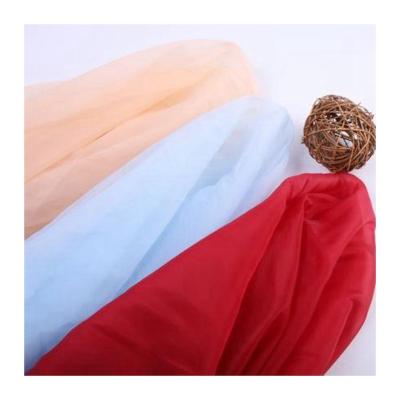 China Soft And Delicate Yarn Fabric Breathable Organza Skirt Organza Perspective Tulle Soft Fabric Wholesale for sale