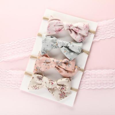 China Newest Elastic Baby Headband Cute Floral Bow Baby Hair Accessories for sale