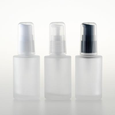 China 30ml 1oz Luxury Cosmetic Base Bottles Glass Pump Liquid Bottle For Sunscreen Cream for sale