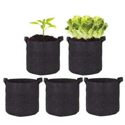 China Hot Sale Eco-friendly Felt Plant Grow Bags Pots Garden Potato Felt Plant Non Woven Fabric Plant Grow Bags Felt Growing Pot for sale