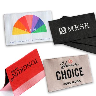 China Low MOQ Sustainable Fitted Woven Labels With Custom Brand Glow In Dark Woven Label For Hats And Garments for sale