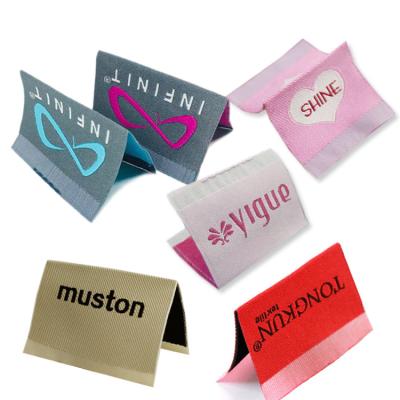 China Sustainable Laser Cut Custom Woven Labels Sewing Handmade Luxury Woven Iron On Soft Garment Tags For Business for sale