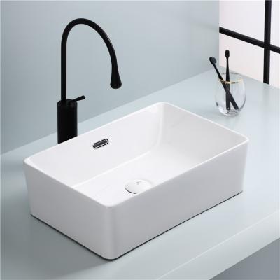 China Durable Classic Design Countertop Handrinse Wash Down Ceramic Art Basin For Bathroom for sale