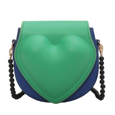 China Fashion Fashion Heart Saddle Bags For Women Designer Paneled Purses And Fashionable PU Leather Handbags Cross - Body Bags Small Flap Bag A Pipeline for sale