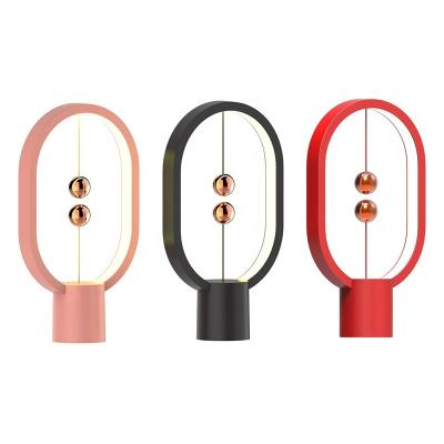 China Contemporary Decorative Led Magnetic Switch Heng Balance Home Decor Innovation LED Desk Lamp With USB Port for sale