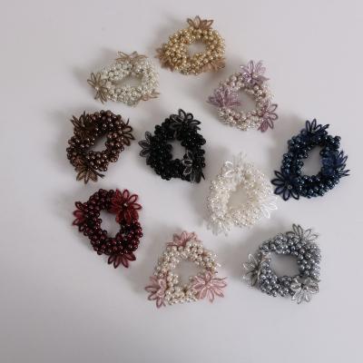 China Fashionable Opp bag 2pcs of new Zou Chrysanthemum Head Hair Rope Ring Cute Girl Wholesale Korean 2022 temperament pearl hair rope simple hair rope for sale