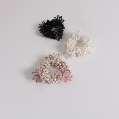 China Cute Senator Korean Style Pearl Hair Rope Hair Rope Zou Chrysanthemum Flower Head Rope Simple Hair Ring Girl Rope Wholesale Hair Ring New for sale