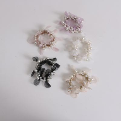 China New Style Hair Accessories 2022 New Style Balls Scalp Tendon Temperament Hair Ring Korean Pearl Rope Female Elegant Hair Ring Tied Ponytail Hair Rope for sale