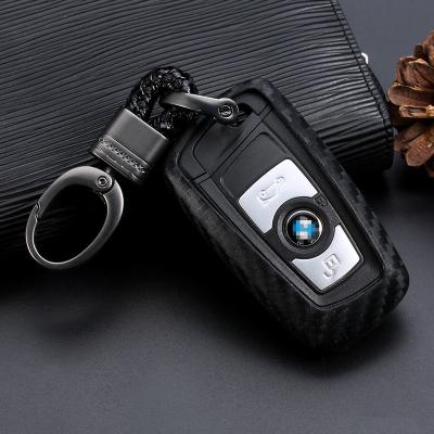 China Fashion Car Accessories Carbon Texture Silicon Car Key Cover Case Shell Suitable For BMW for sale